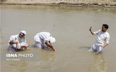 تصاویر: غسل تعمید کودکان مندایی در اهواز و سوسنگرد
